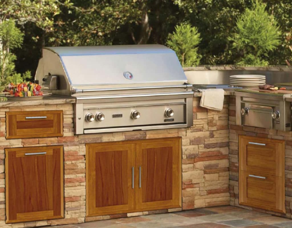 Stainless grill in a stone surround with shaker-style solid teak doors and drawers